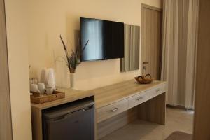 TV a/nebo společenská místnost v ubytování Vina Oliva Resort
