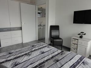Vuode tai vuoteita majoituspaikassa Pension AdlerHorst