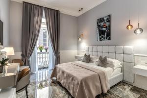 Cama ou camas em um quarto em Rome55 - Piazza di Spagna