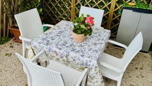 a table with a potted plant sitting on it at The Dream in Massa Lubrense