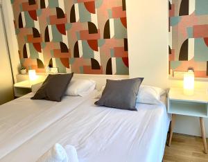 Posteľ alebo postele v izbe v ubytovaní Xuloss Apartments 1