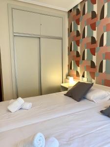 Posteľ alebo postele v izbe v ubytovaní Xuloss Apartments 1