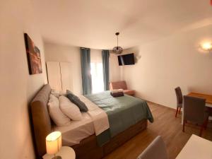 Posteľ alebo postele v izbe v ubytovaní Studio apartman Ana
