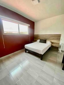 Ένα ή περισσότερα κρεβάτια σε δωμάτιο στο Apartment10 minutes APTGDL