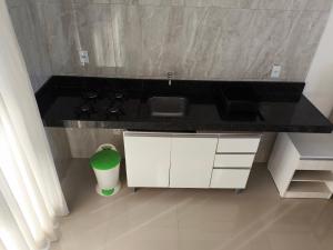 a kitchen with a stove and a counter top at Vista da Serra in Penedo