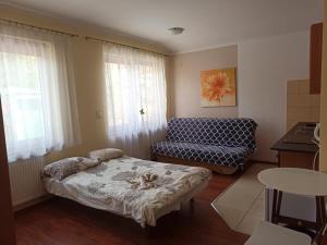 Cama ou camas em um quarto em Dom nad Wisłą - pobyty rodzinne, grupowe, terapie