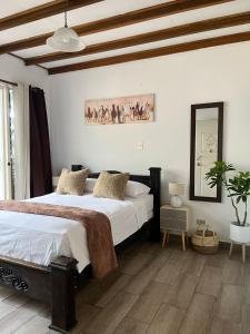 Postel nebo postele na pokoji v ubytování Gaudy's Hotel