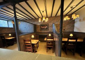Ein Restaurant oder anderes Speiselokal in der Unterkunft Ravenstone Lodge Country House Hotel 