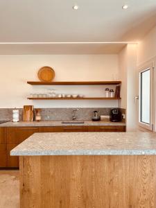 Η κουζίνα ή μικρή κουζίνα στο Andreia +15 φωτογραφίες