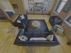 Area soggiorno di Brick City Loft