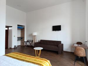 TV a/nebo společenská místnost v ubytování Casona Tobar Hotel
