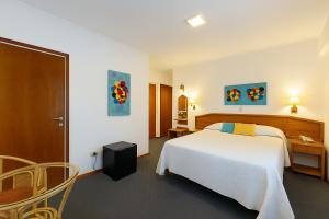 Postel nebo postele na pokoji v ubytování Hotel España