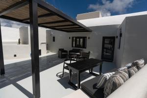 Posezení v ubytování Rosaviglia Luxury Villa - an Oia Private Hideaway