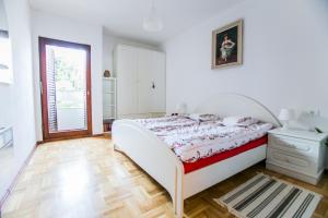 Voodi või voodid majutusasutuse Grand View Apartments toas