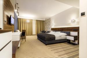 Llit o llits en una habitació de Hotel Pory Roku