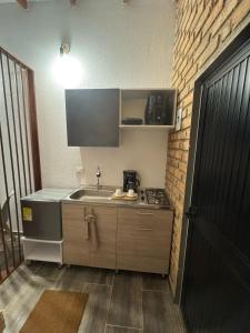 Kuchyň nebo kuchyňský kout v ubytování Cabañas La Sanguina, Loft H1
