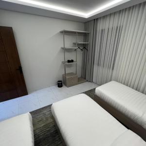 Postel nebo postele na pokoji v ubytování Bee House