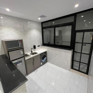 Kuchyň nebo kuchyňský kout v ubytování Bee House