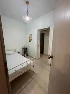 Postel nebo postele na pokoji v ubytování Central Mark-Δωμάτια Διαμερίσματος