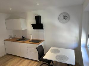 Kuchyň nebo kuchyňský kout v ubytování Traum-Immo-Home Apartments