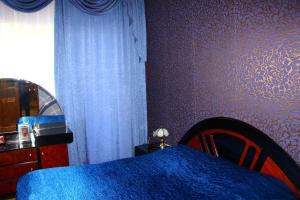 Postel nebo postele na pokoji v ubytování Guest House Lazika