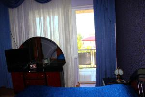 Postel nebo postele na pokoji v ubytování Guest House Lazika