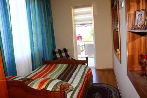 Postel nebo postele na pokoji v ubytování Guest House Lazika