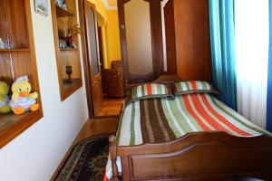 Postel nebo postele na pokoji v ubytování Guest House Lazika
