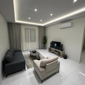 TV a/nebo společenská místnost v ubytování Bee House