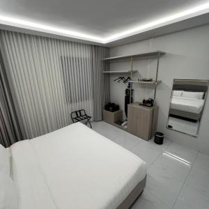 Postel nebo postele na pokoji v ubytování Bee House