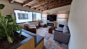 Μια τηλεόραση ή/και κέντρο ψυχαγωγίας στο Casa Hacienda Maguey