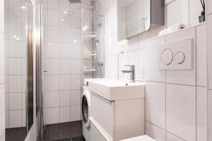 Ένα μπάνιο στο Royal Neighbourhood Elegant Flat In Central Oslo