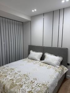 Postel nebo postele na pokoji v ubytování Apartment U Tower