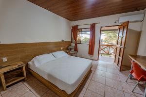 Letto o letti in una camera di Hotel Nantu Hostería
