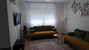 Ruang duduk di Apartman Marvitus 5 Luxury