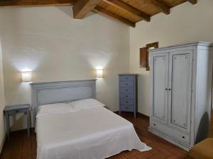 Postel nebo postele na pokoji v ubytování Lebbiano Residence