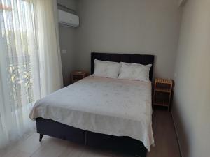 Postel nebo postele na pokoji v ubytování Villa BB Mugla 2 + 9 fotografií