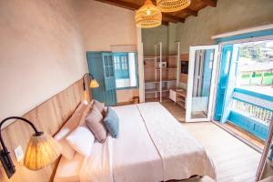 Ένα ή περισσότερα κρεβάτια σε δωμάτιο στο Hotel Salento Real Eje Cafetero