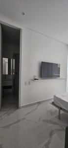 TV a/nebo společenská místnost v ubytování Hermoso apartamento en Pozos Colorados Santa Marta