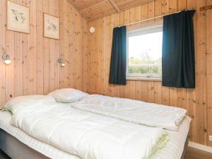 Postel nebo postele na pokoji v ubytování Holiday Home Kirsebærvænget III