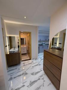 Kuchyň nebo kuchyňský kout v ubytování Appartement internationale