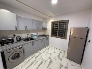 Kuchyň nebo kuchyňský kout v ubytování Appartement internationale