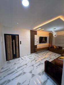 TV a/nebo společenská místnost v ubytování Appartement internationale