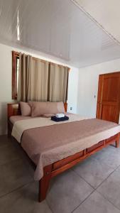 Postel nebo postele na pokoji v ubytování Coconut Lodge Pavones