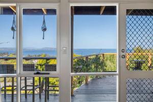 a view from the front door of a house at Ocean Views 20kms from CBD Sleeps 10 in Kingston Beach