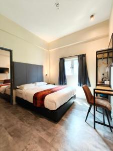 Pangkor Pop Ash Hotel客房内的一张或多张床位