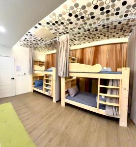 Postel nebo postele na pokoji v ubytování 綠島海灣會館Bay Resort