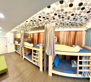 Postel nebo postele na pokoji v ubytování 綠島海灣會館Bay Resort