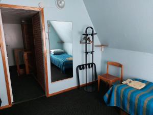 Postel nebo postele na pokoji v ubytování Livonia Matkamaja