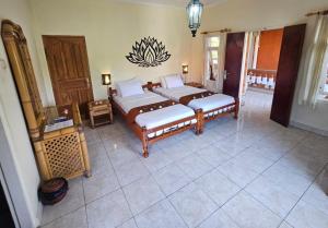 Postel nebo postele na pokoji v ubytování Hotel Chonos